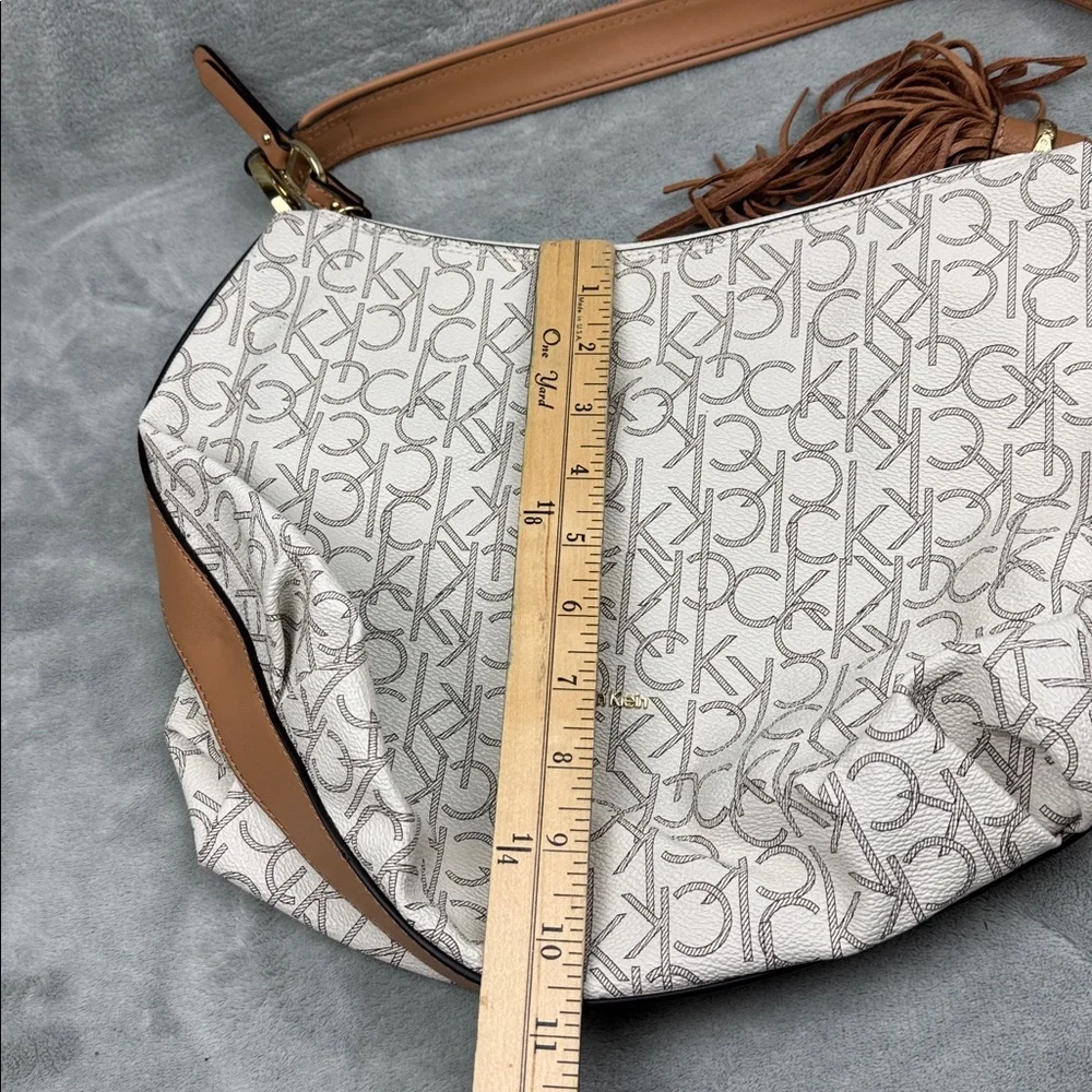 Calvin Klein Logo Print Hobo Bag in Cream and Brown
